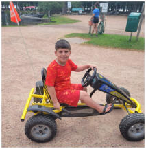 Boy on go-kart at Lynn Ann's Campground